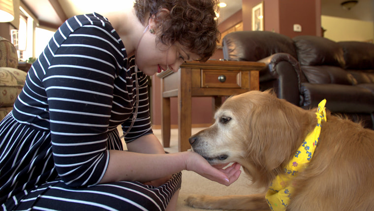 Image: Emily Brown, 31, and her dog.