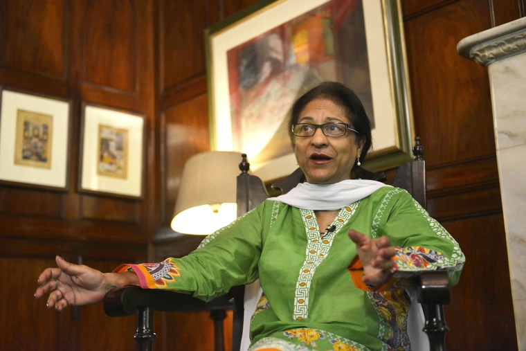 Image: Asma Jahangir gestures during an interview in Lahore