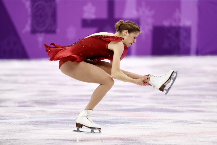 Carolina Kostner of Italy competes in the figure skating team event women's short program on Feb. 11.