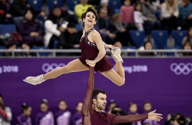 Canada's Meagan Duhamel and Eric Radford compete in the figure skating team event pair skating free skating on Feb. 11.