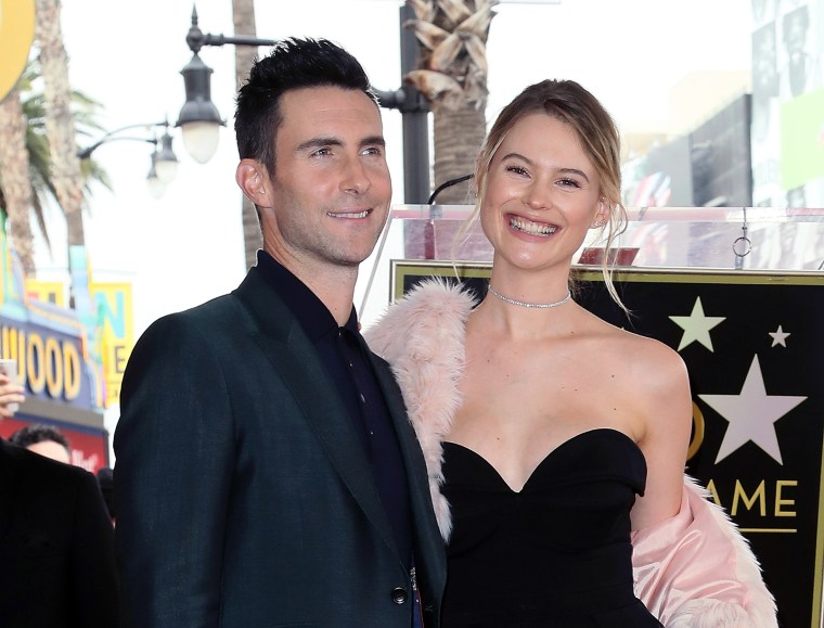 Adam Levine (L) and wife model Behati Prinsloo