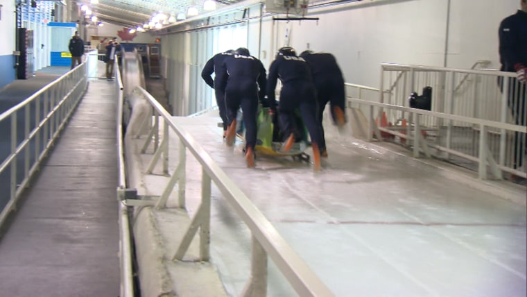 Two other soldiers, Captain Chris Fogt and Sergeant Justin Olsen, join Weber in his bobsled. 