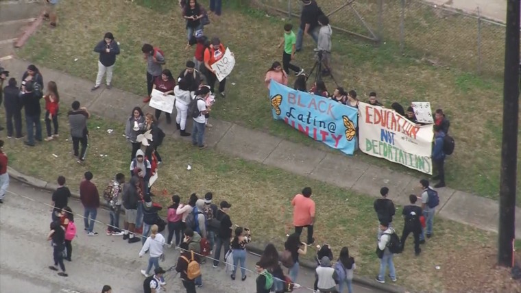 Image: Students at a Houston high school stage a walkout protesting recent deportations