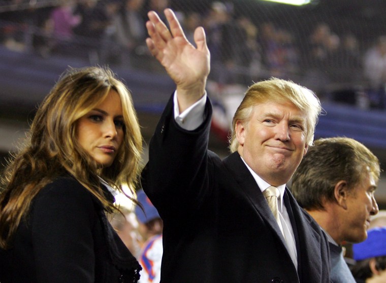 Image: Donald Trump waves to fans as he arrives with his wife Melania Knauss