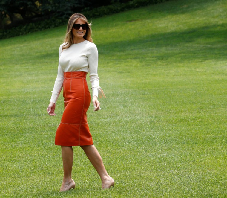 Image: Melania Trump looks back as U.S. President Trump waves upon his departure from the White House to embark on his trip to the Middle East and Europe, in Washington