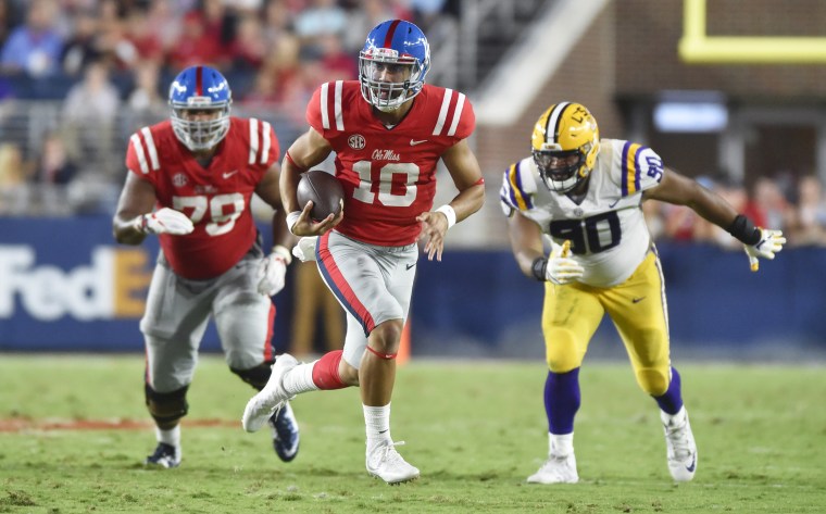 Mississippi Rebels quarterback Jordan Ta'amu finds open space a game against the LSU Tigers in 2017.