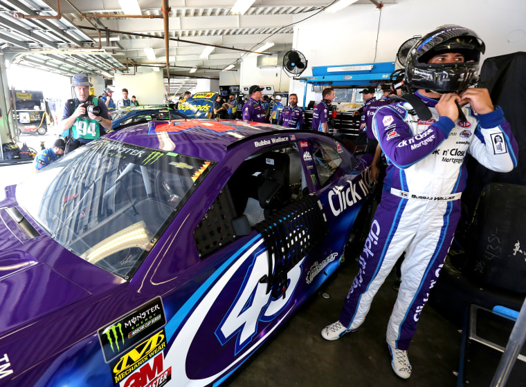 Image: Darrell Wallace Jr., driver of the #43 Click n' Close Chevrolet, climbs into his car in the garage area during practice for the Monster Energy NASCAR Cup Series Daytona 500 at Daytona International Speedway on Feb. 10, 2018.