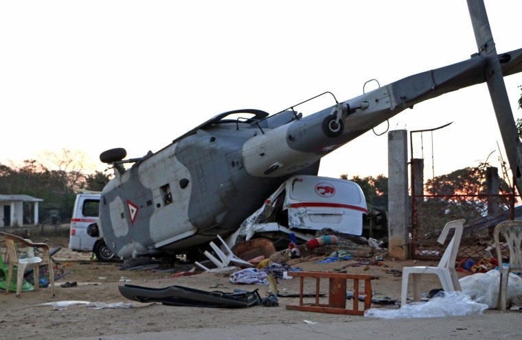 Image: The remains of the military helicopter that fell on a van in Santiago Jamiltepec, Oaxaca state, Mexico, on Feb. 17, 2018.