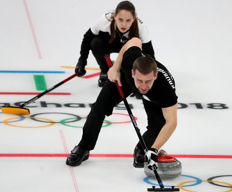 Image: Anastasia Bryzgalova and Alexander Krushelnitskiy of Olympic Athletes of Russia in action in the mixed doubles bronze medal match between Norway and Olympic Athletes of Russia at the Gangneung Curling Center on Feb. 13, 2018.