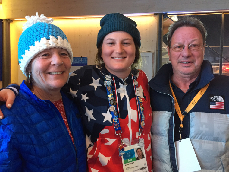 Devin Logan bonds with her parents Nancy and Jerry Logan while competing in the 2018 Winter Olympics.