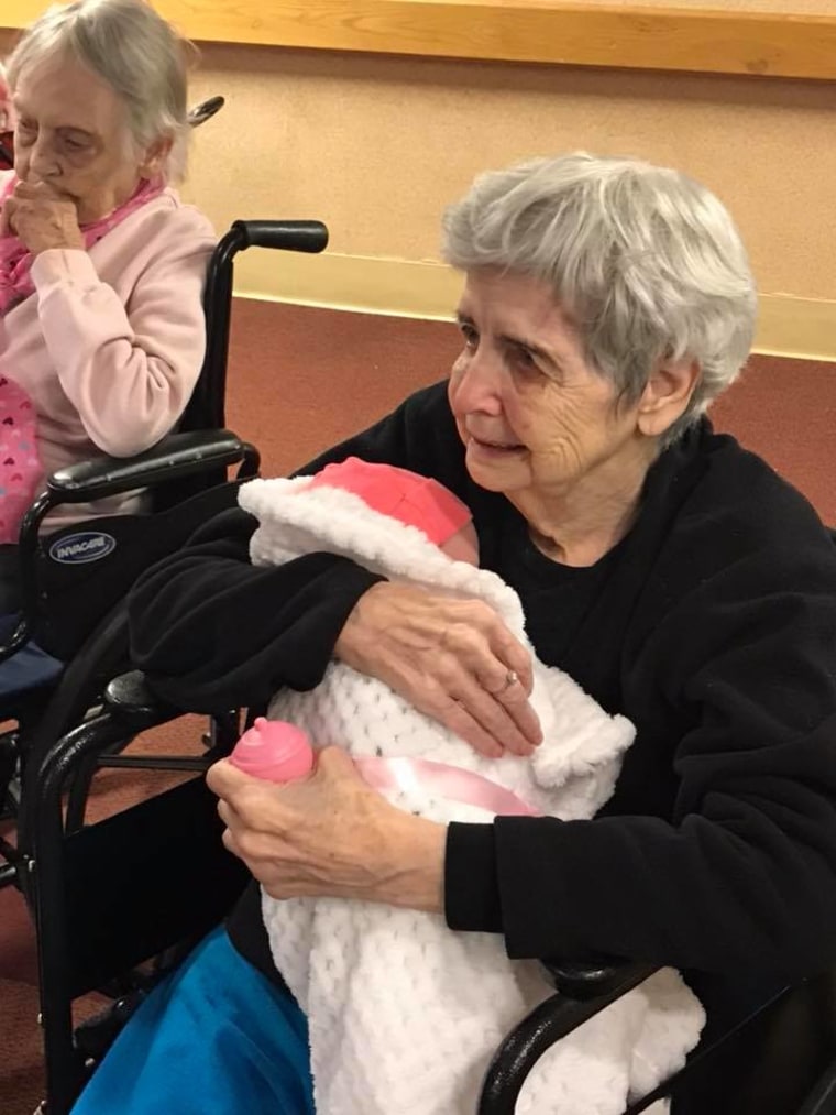 Alzheimer's patients show joy when they receive baby dolls