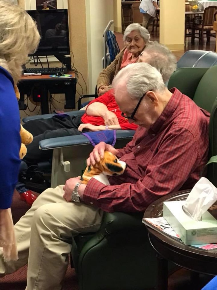 Alzheimer's patients show joy when they receive baby dolls