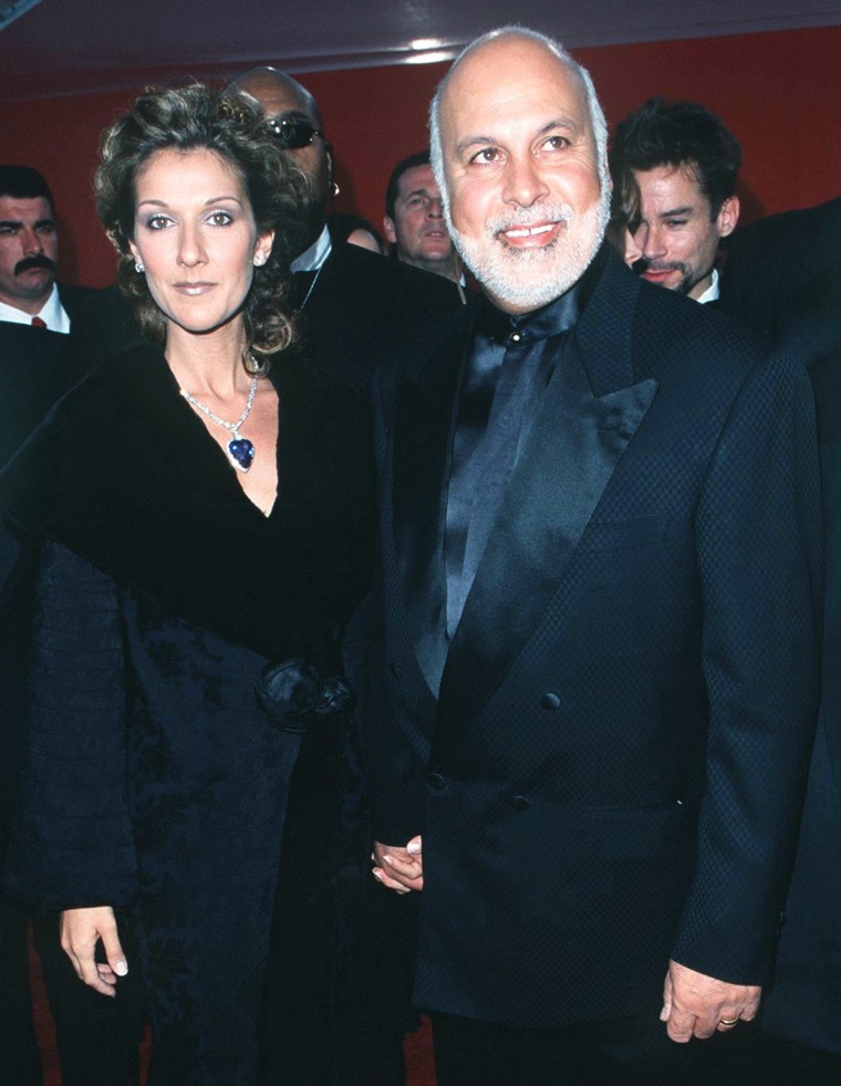 Celine Dion and husband Rene Angelil during The 70th Annual Academy Awards - Red Carpet at Shrine Auditorium in Los Angeles, California.