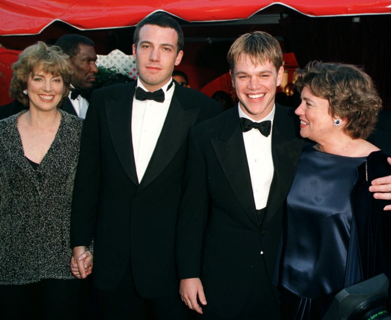Actor-writers Ben Affleck and Matt Damon arrive with their mothers Chris and Nancy at the 70th Annual Academy Awards 23 March in Los Angeles, CA. Affleck and Damon are nominted for best original screenplay for \"Good Will Hunting.\" Damon is also nominated for best actor for the same film.