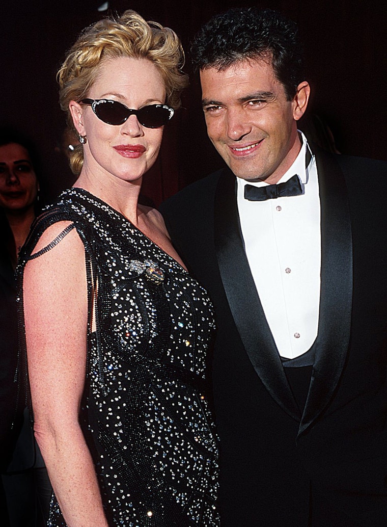 Melanie Griffith and Antonio Banderas during The 70th Annual Academy Awards - Red Carpet at Shrine Auditorium in Los Angeles, California.
