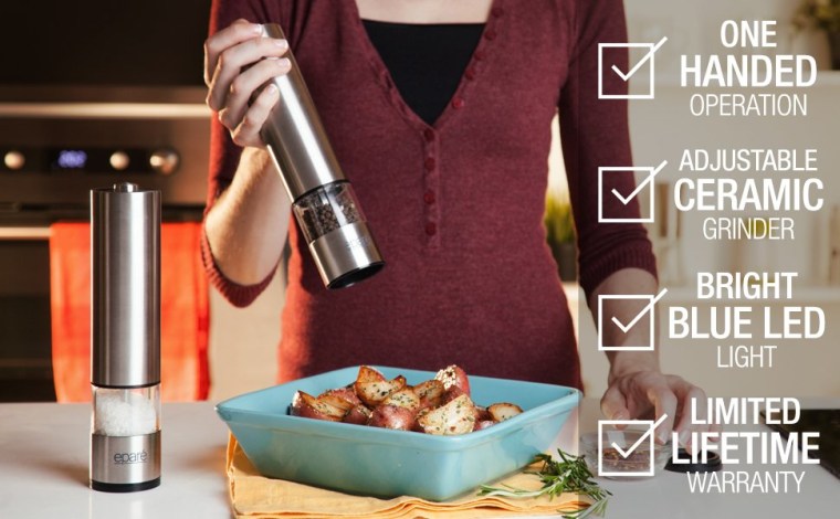 Woman using grinder on potatoes