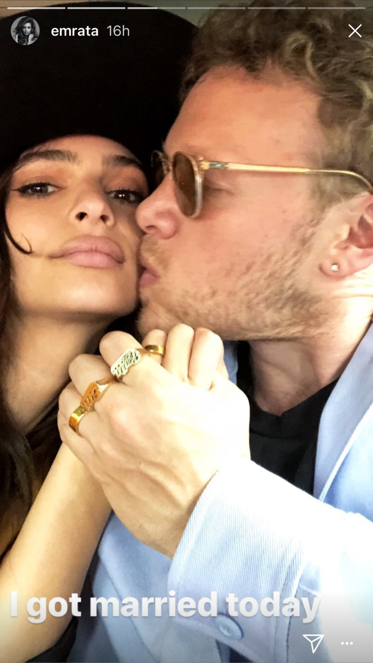 Emily Ratajkowski got a post-wedding kiss from Sebastian Bear-McClard.