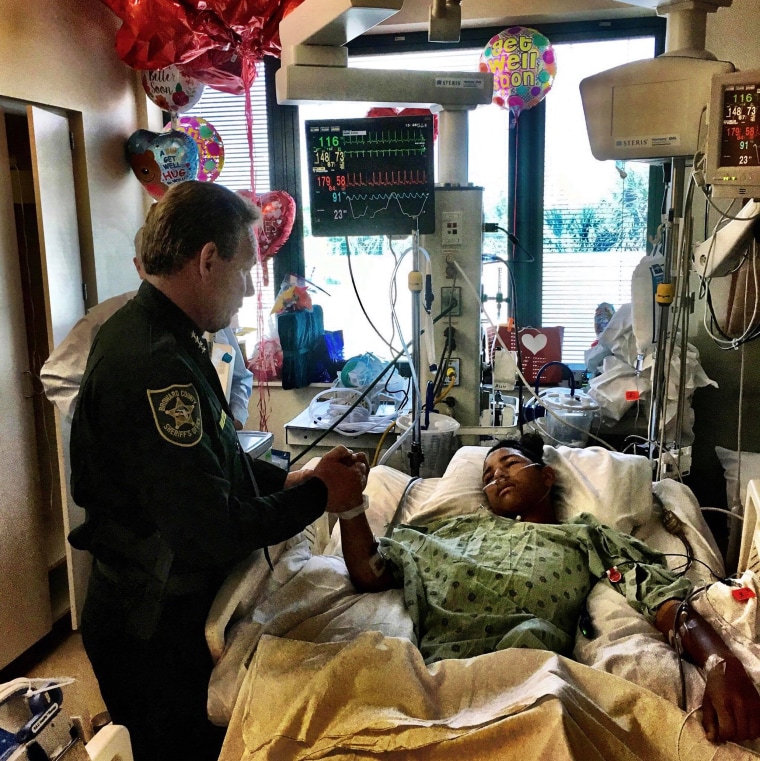 Image: Broward County Sheriff Scott Israel visits Anthony Borges in hospital