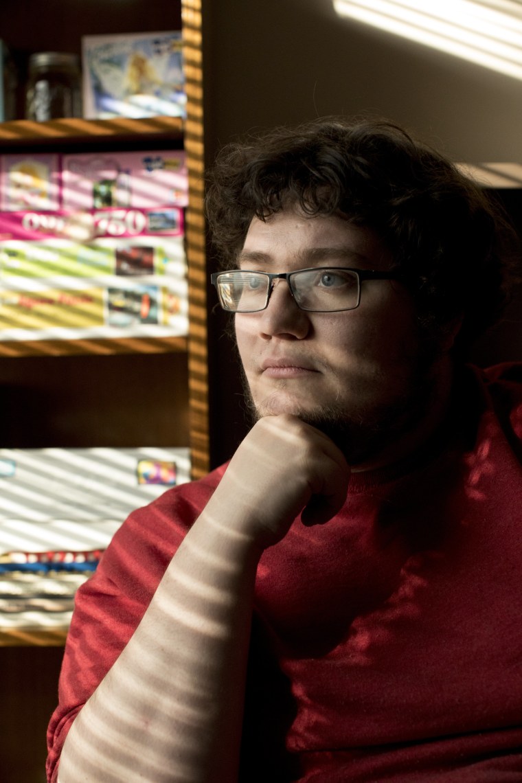 Image: Nathan Sames, 28, America Corp Vista volunteer poses for a portrait at the Participation Station in Lexington, Ky.