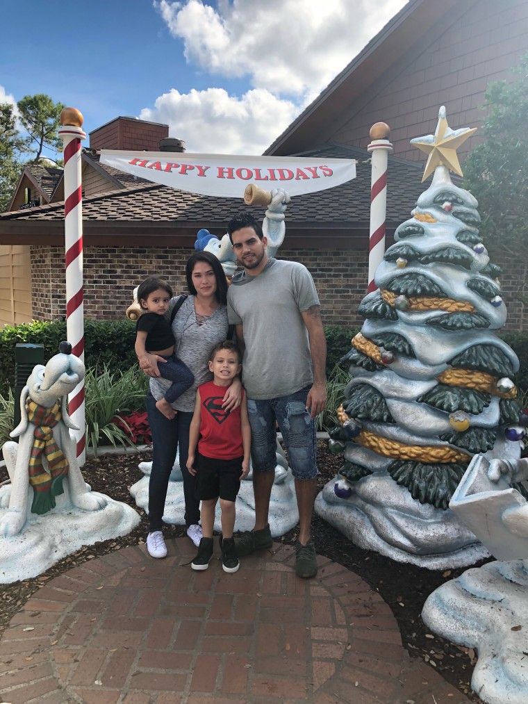 Gamalier Roche and his family outside their home in Kissimmee, Florida. Roche attended Sami Haiman-Marrero's welcoming workshops when he moved from Puerto Rico in 2014 and found the advice invaluable.