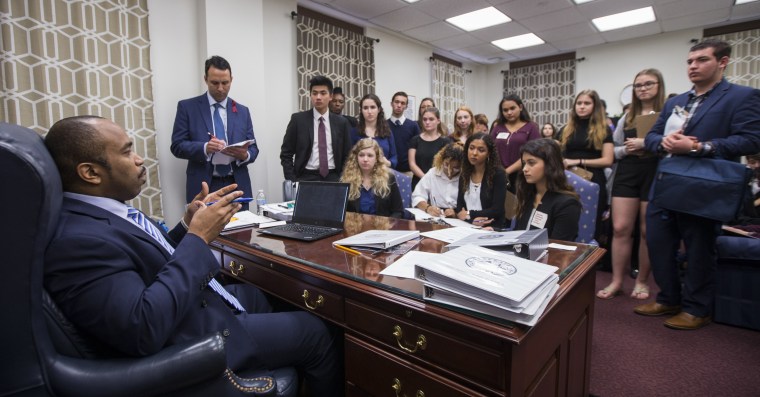 Image: Sen. Bobby Powell talks with survivors from Marjory Stoneman Douglas High School