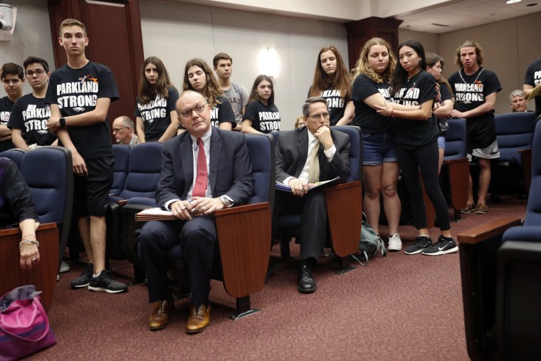 Image: Lobbyists and attorneys listen