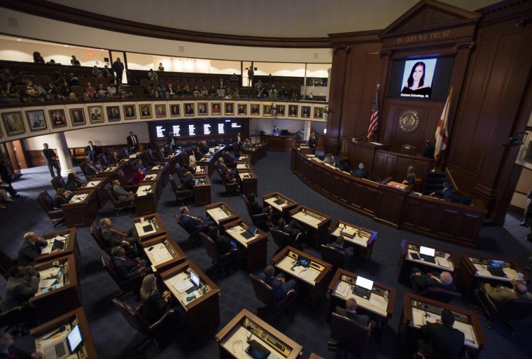 Image: A slideshow of the 17 people killed at Marjory Stoneman Douglas High School, is played at the Florida Capitol in Tallahassee,