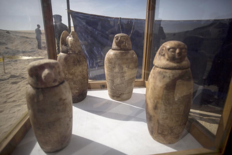Image: Four canopic jars, made of alabaster with lids bearing the faces of the four sons of god Horus, that were unearthed are displayed at the site of an ancient Egyptian cemetery, in Minya province, 245 km south of Cairo, Egypt, on Feb. 24, 2018.