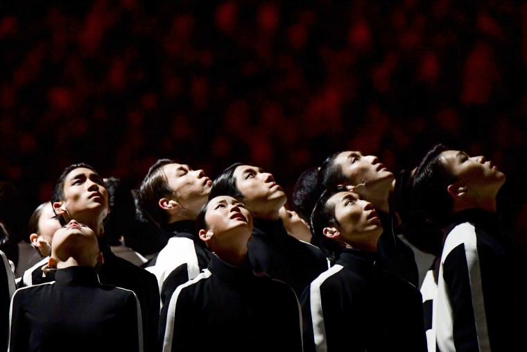 Artists perform during the closing ceremony.