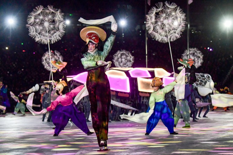 Artists dance during the closing ceremony.
