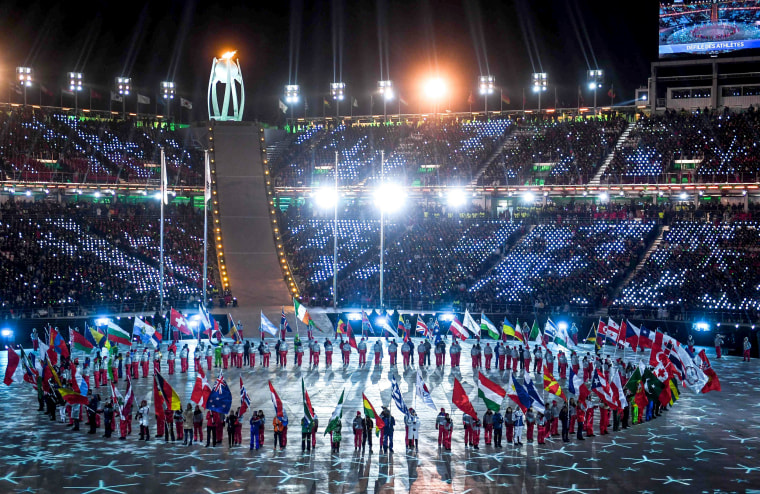 Flagbearers arrive during the closing ceremony of the Pyeongchang 2018 Winter Olympic Games at the Pyeongchang Stadium on Feb. 25, 2018.
