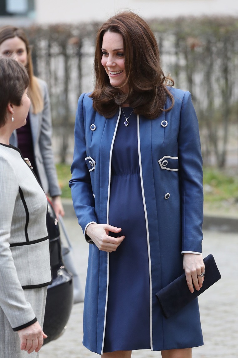 Catherine, The Duchess of Cambridge visits the Royal College of Obstetricians and Gynecologists on February 27, 2018 in London. She wore a Jenny Packham blue coat with a matching blue dress and blue Jimmy Choo heels.