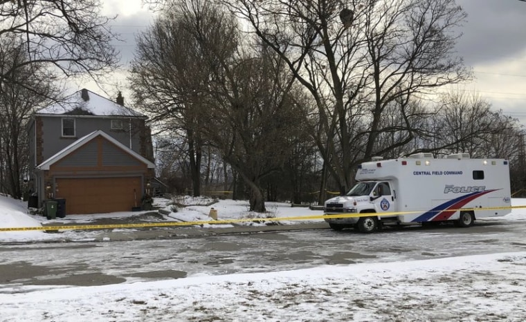 In this Feb. 3, 2018 file photo, crime scene tape surrounds a property where police say they recovered the remains of at least six people from planters on the property which is connected to alleged serial killer Bruce McArthur, in Toronto, Canada.