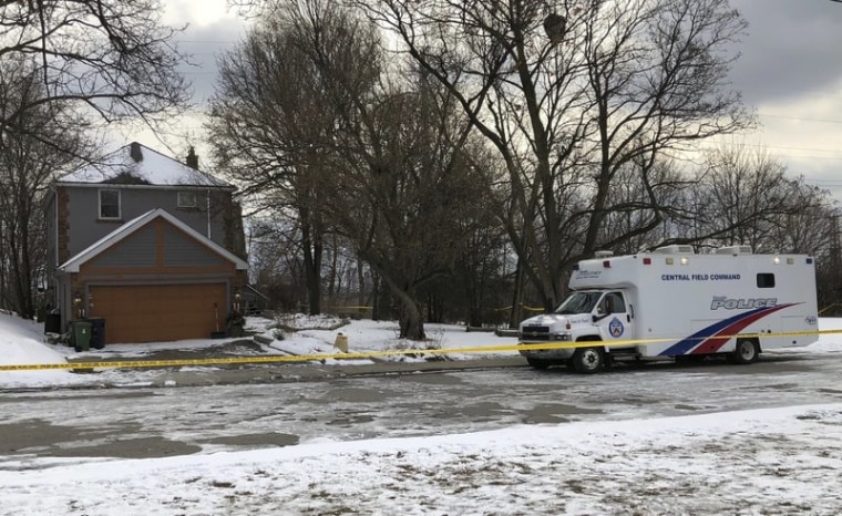 In this Feb. 3, 2018 file photo, crime scene tape surrounds a property where police say they recovered the remains of at least six people from planters on the property which is connected to alleged serial killer Bruce McArthur, in Toronto, Canada. 