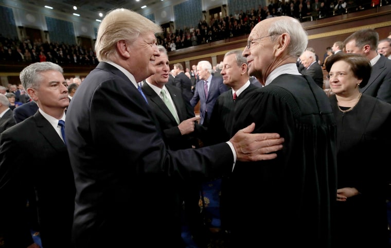 Image: U.S. President Donald Trump greets Supreme Court Associate Justice Stephen Breyer