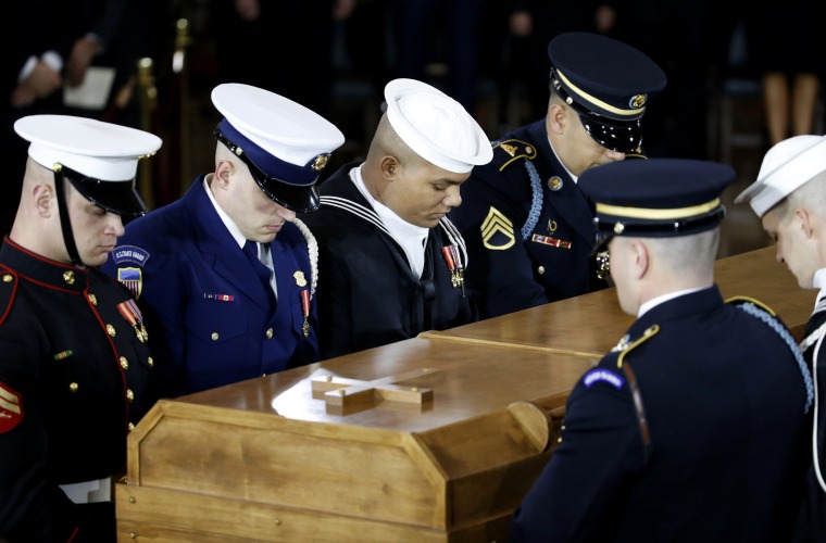 Image: Military members carry the casket during ceremonies for the late Rev. Billy Graham in Washington