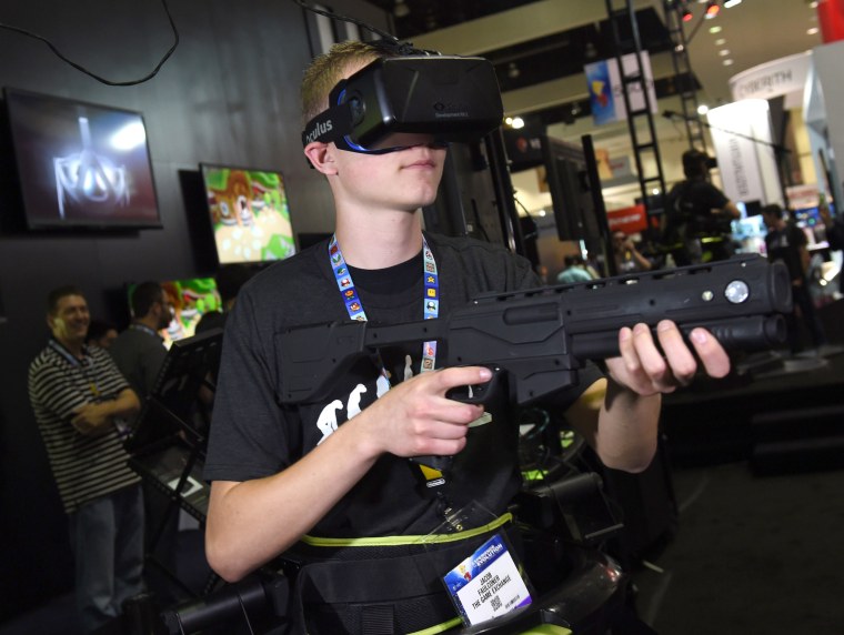 Image: A gamer plays a game during the Electronic Entertainment Expo