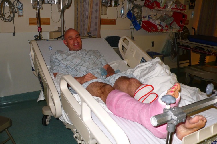 Donald smiles with his pink cast in a hospital in New York.