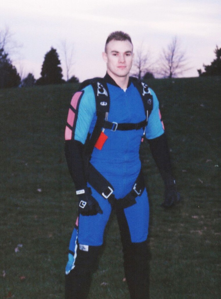 Donald Zarda poses for a picture in his skydiving jumpsuit.