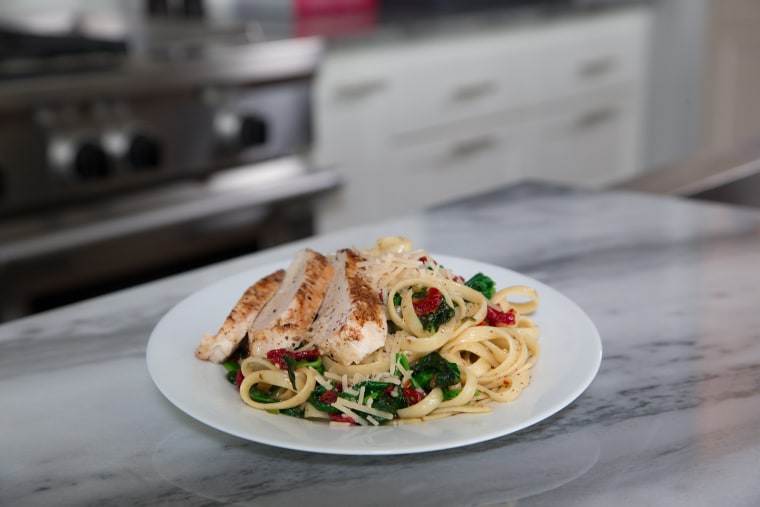 Basil garlic chicken fettuccini with spinach meal kit.