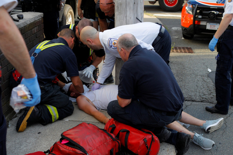 Image: Paramedics and Firefighters Treat Unresponsive Man