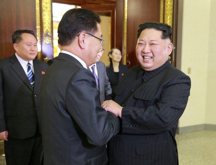 Image: North Korean leader Kim Jong Un greets a member of the special delegation of South Korea's President at a dinner in this photo released by North Korea's Korean Central News Agency