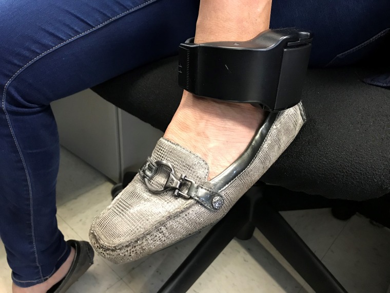 Miriam's electronic monitoring device, issued by ICE, must be worn 24/7.