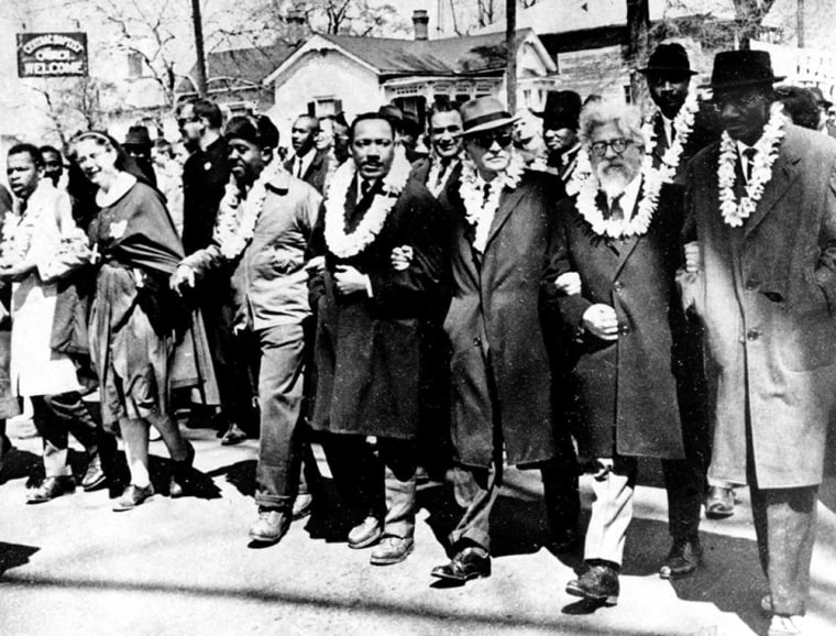 Image: The Rev. Martin Luther King Jr. links arms with other civil rights leaders