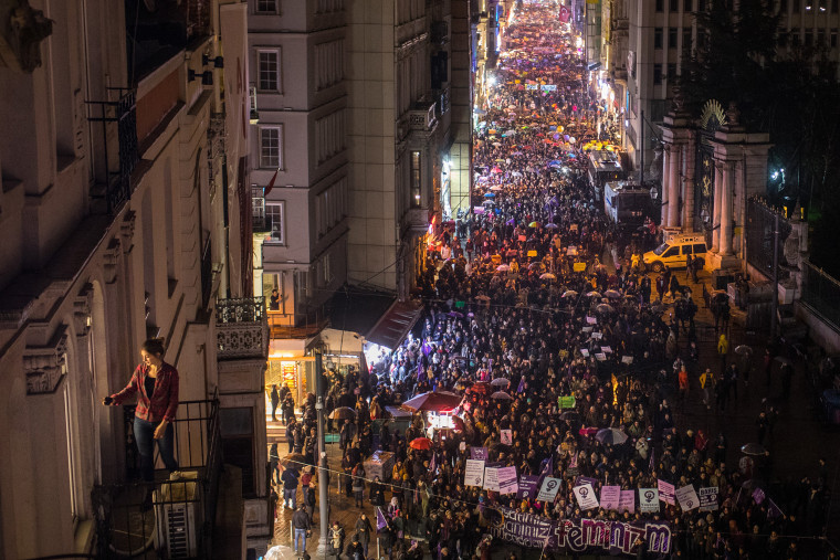 'Now we act': Women stand together for equality on International Women's Day