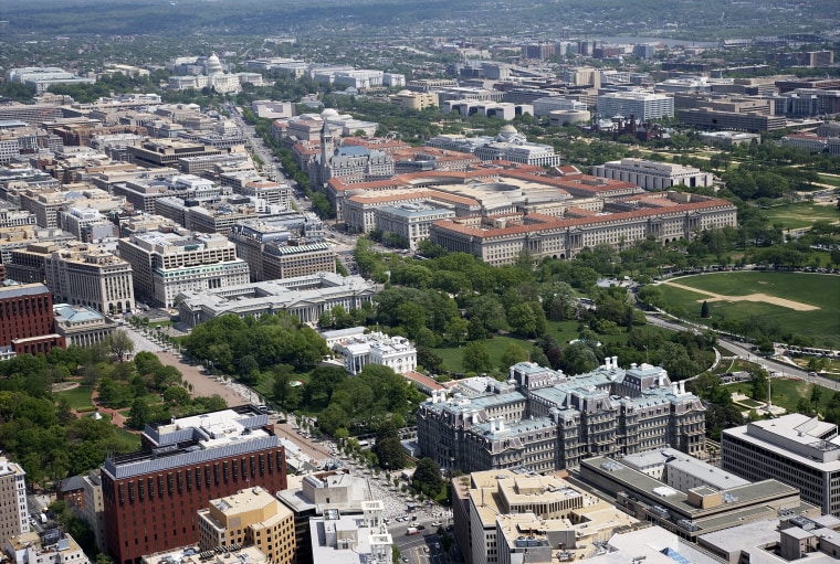 Aerial view of White House, Old Executive Office Building, Pennsylvania Avenue and the U.S. Capitol,