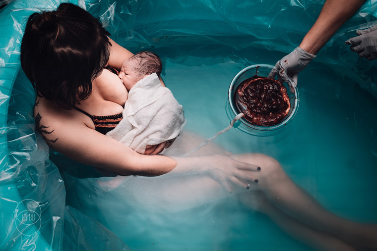Caption: Second place winner, breastfeeding category: \"Tranquility\" by Veronika Richardson

Link: http://www.foxvalleybirthandbaby.com