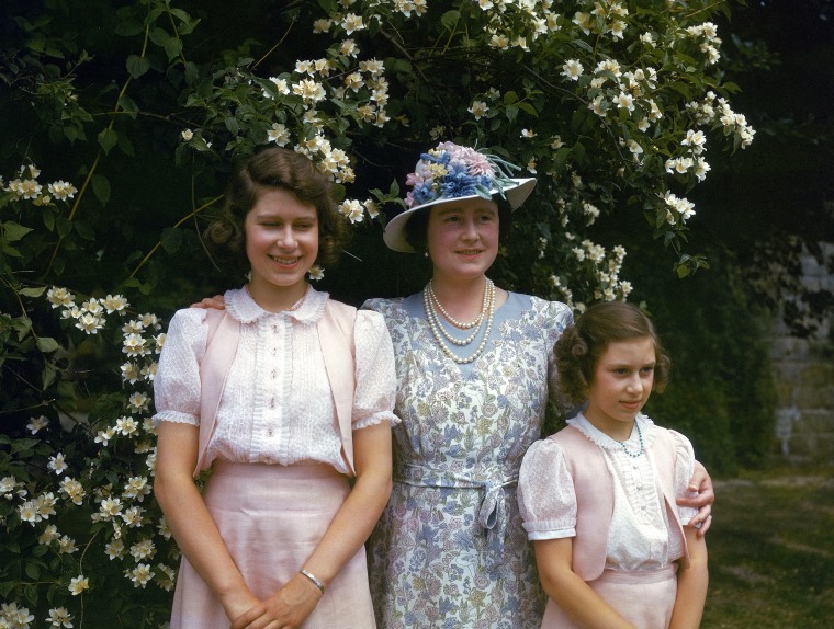 The Queen Mother with Princess Margaret (right) and Princess Elizabeth at Windsor Castle in England on July 8, 1941.