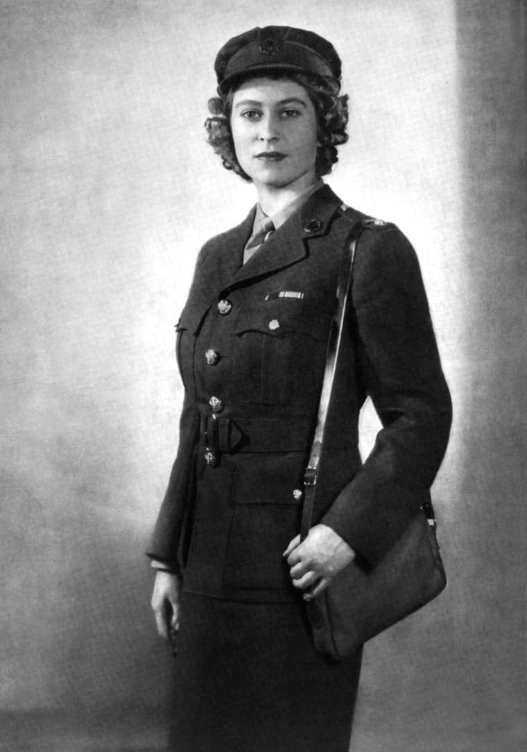 In 1945, Princess Elizabeth joined the Army's Auxilliary Territorial Service as a mechanic. She was one of 200,000 women who joined the service at that time. The women wore khaki belted jackets, skirts, tie up shoes and caps.