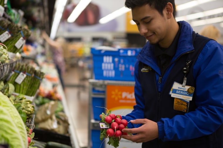 Walmart personal shoppers handle grocery deliveries.